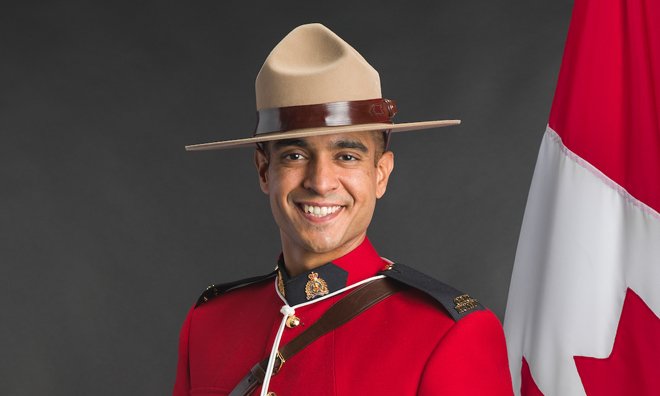 Constable Cst. Harvinder Singh Dhami  in red serge RCMP uniform