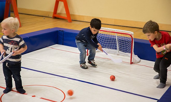 Kids playing mini stick hockey at SportZone