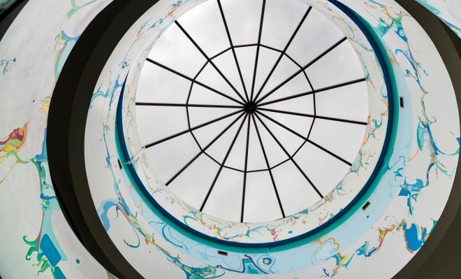 Abstract images painted on spiral staircase
