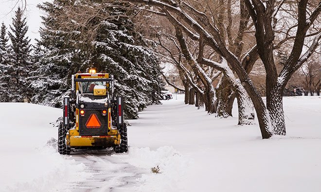 Image showing equipment clearing snow from a County trail