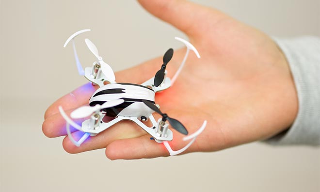 Mini-drone on the palm of a child's hand