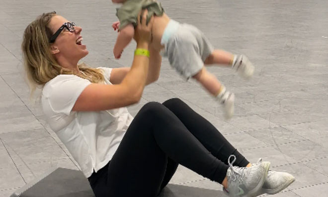 Parent exercises with baby