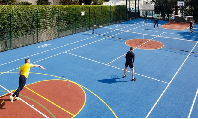 Sport Court with people playing tennis