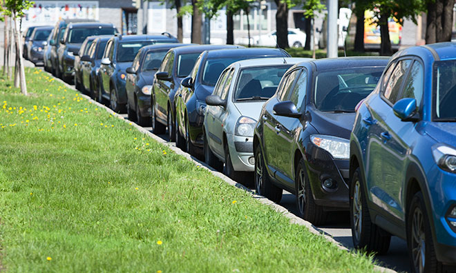 Image of cars parked along the curb