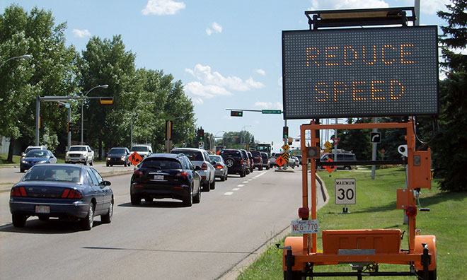 Image of a road sign advising of construction ahead