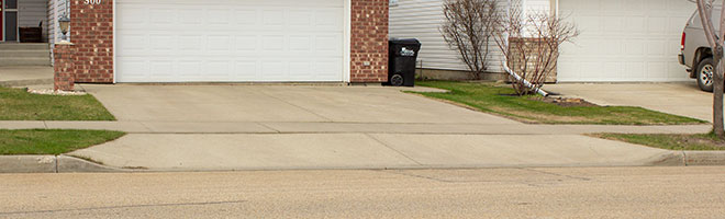 Image showing a house that has a drop driveway in front of it