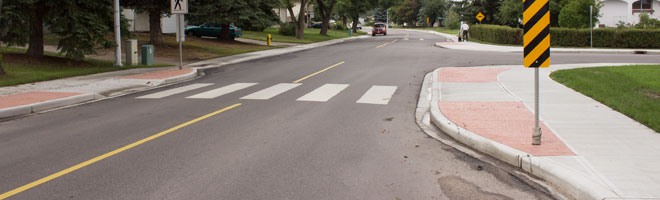 Image showing a curb extension on a residential street crosswalk to help with pedestrian safety