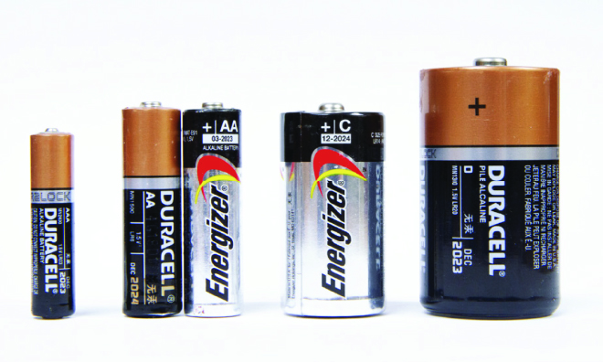 Image of different types of alkaline batteries, AAA, AA, C and D.