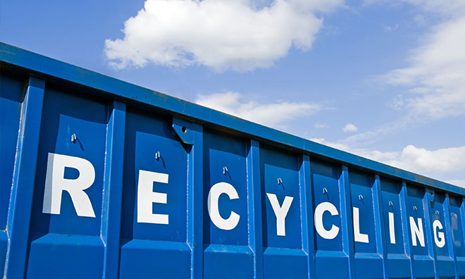 Image of a large blue recycling bin.